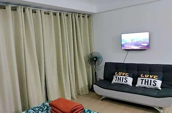 Rqui Condotel Near Airport & World 호텔 3*